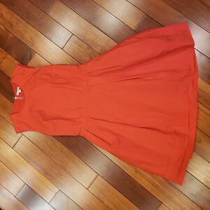 Orange Sleeveless Fit and Flare dress.  Women's size 4. Pockets